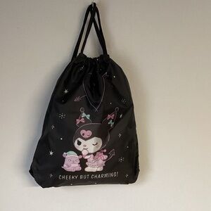 Playful Black Drawstring Bag with Cheeky Design